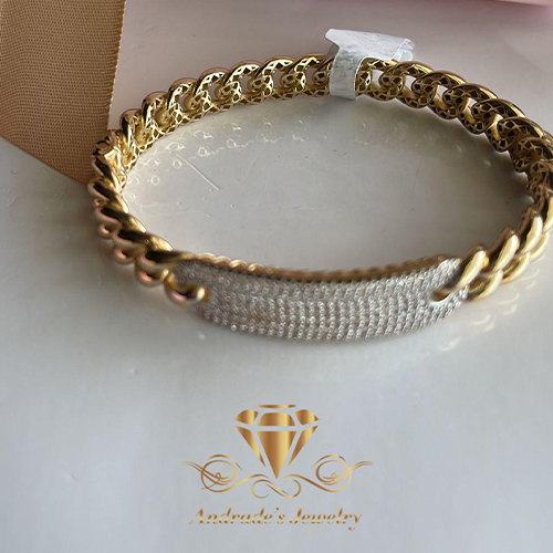 Brazalete oro amarillo con piedra blancas