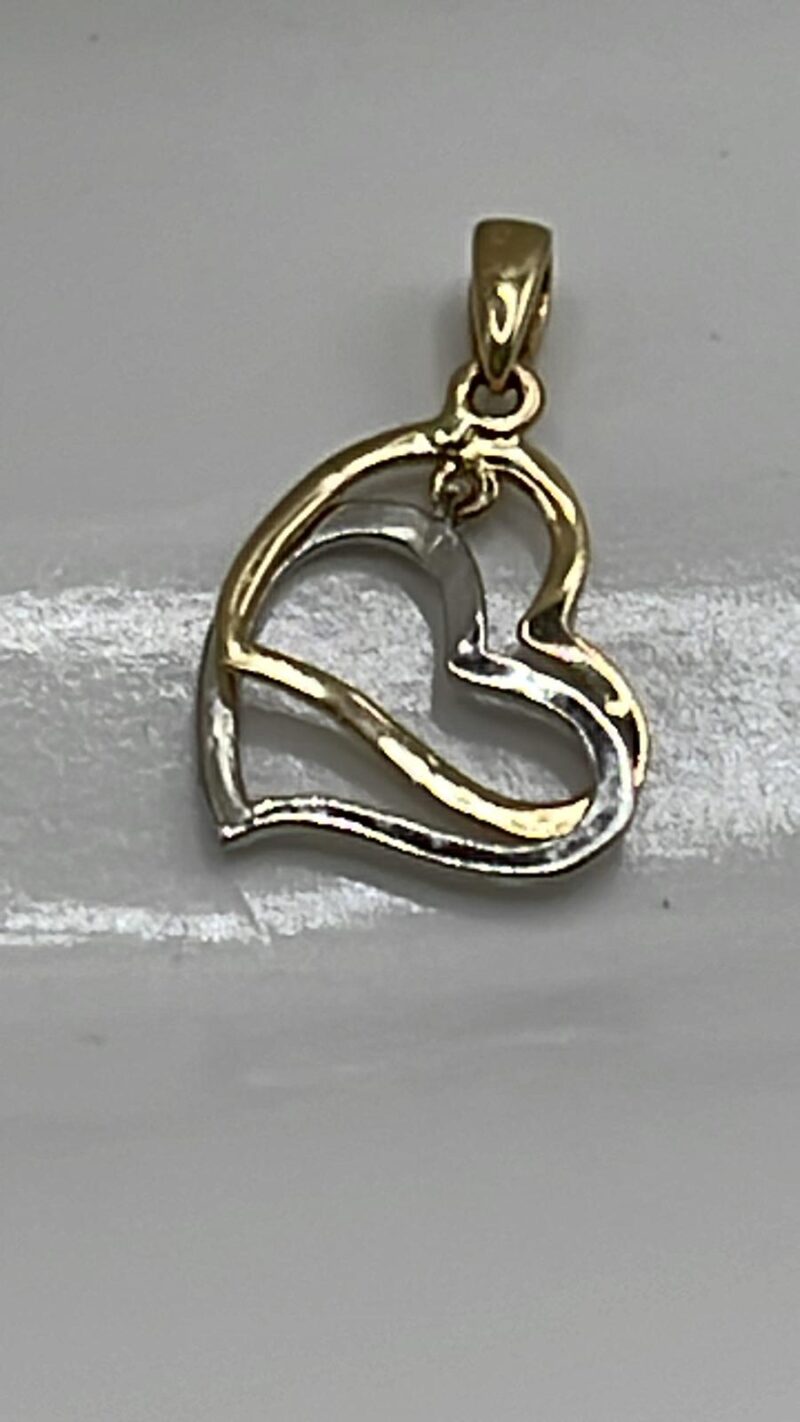 Dije de 2 corazones oro blanco y amarillo