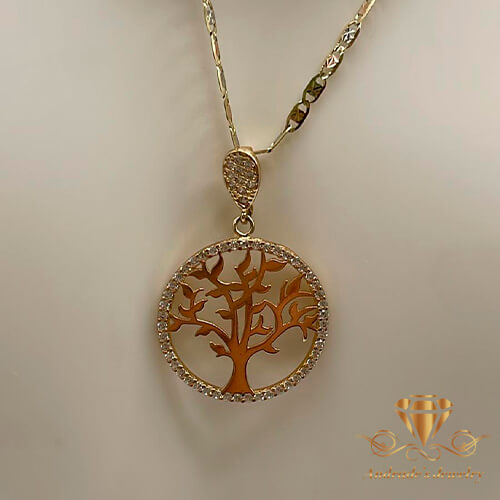 Dije del árbol de la vida con piedras blanca